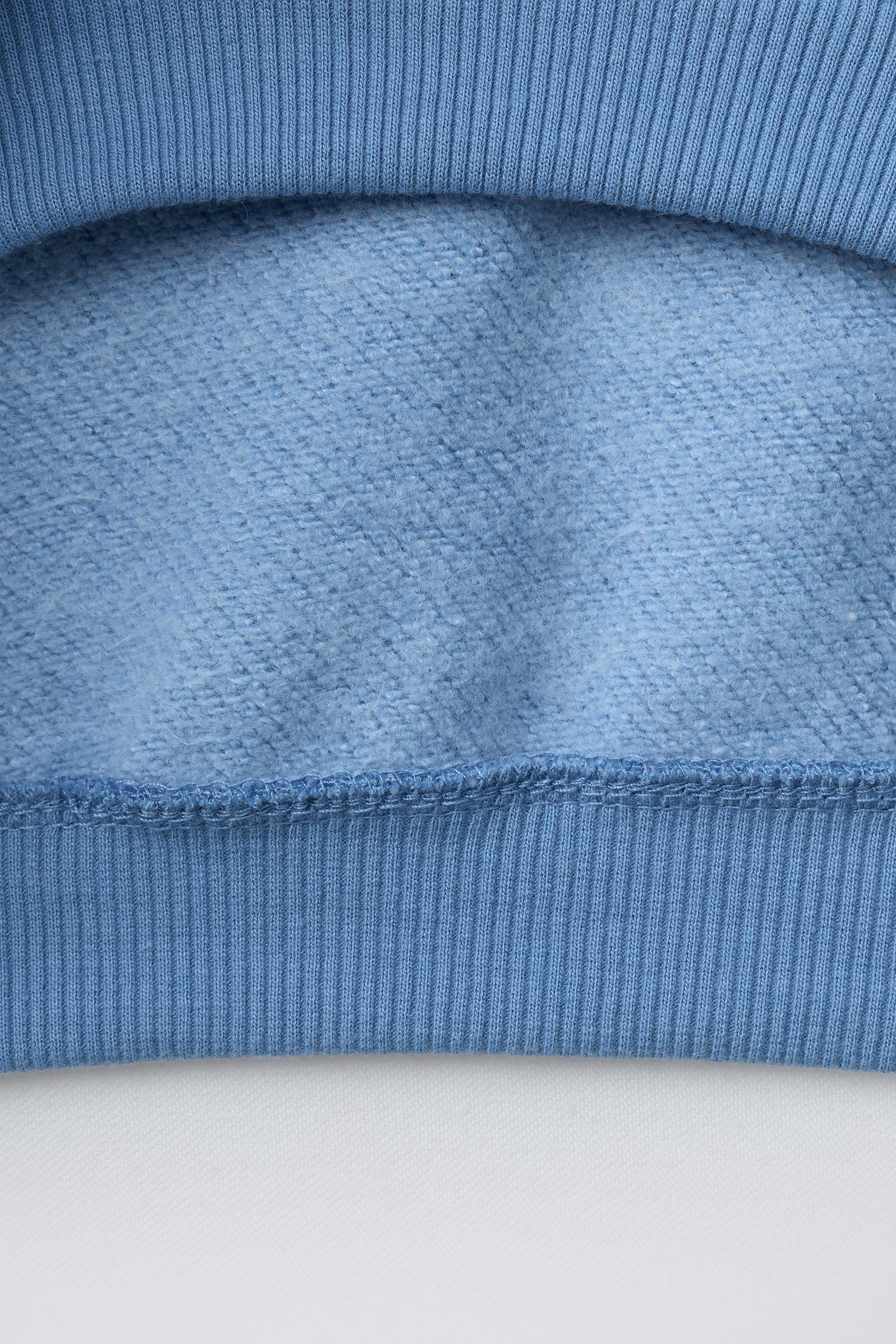 SWEAT BASIQUE À INSCRIPTION